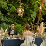 コーラル・テラス石垣島・沖縄結婚式　テラス・ロマンティックディナー　トライアングルアーチ＆シャンデリア＆フラワー装飾